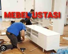 Mebel ustası mebelerin sökülüb yığılması