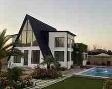 A-frame ev tikintisi